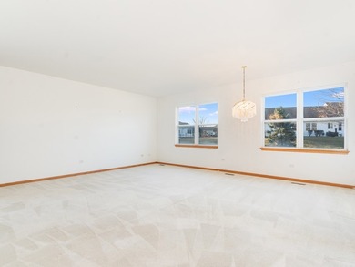 Sprawling ranch townhome with stunning pond views in the sought on The Links at Carillon in Illinois - for sale on GolfHomes.com, golf home, golf lot