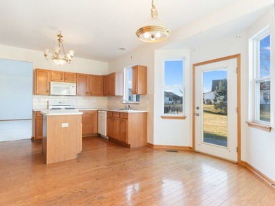 Sprawling ranch townhome with stunning pond views in the sought on The Links at Carillon in Illinois - for sale on GolfHomes.com, golf home, golf lot