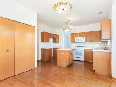 Sprawling ranch townhome with stunning pond views in the sought on The Links at Carillon in Illinois - for sale on GolfHomes.com, golf home, golf lot