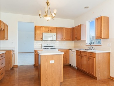 Sprawling ranch townhome with stunning pond views in the sought on The Links at Carillon in Illinois - for sale on GolfHomes.com, golf home, golf lot