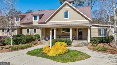 Nestled within the prestigious Reynolds Lake Oconee community on Reynolds Lake Oconee - The National  in Georgia - for sale on GolfHomes.com, golf home, golf lot