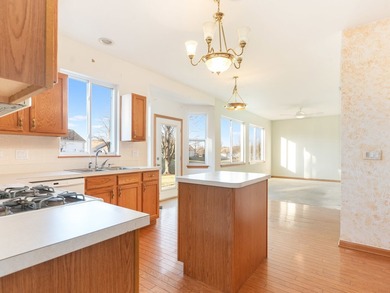 Sprawling ranch townhome with stunning pond views in the sought on The Links at Carillon in Illinois - for sale on GolfHomes.com, golf home, golf lot