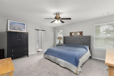 Welcome to this spacious 4-bedroom, 2.5-bath home in Covington on Indian Creek Golf Club in Georgia - for sale on GolfHomes.com, golf home, golf lot
