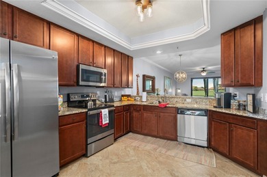 Impeccably maintained first-floor residence, being sold turn key on Lakewood National Golf Club in Florida - for sale on GolfHomes.com, golf home, golf lot