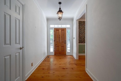 Discover timeless Southern elegance and luxury lakefront living on Great Waters Course At Reynolds Plantation in Georgia - for sale on GolfHomes.com, golf home, golf lot