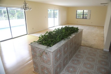 Welcome to 1436 SE Sunshine Ave, located in the highly desirable on Santa Lucia River Club in Florida - for sale on GolfHomes.com, golf home, golf lot