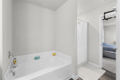 Welcome to this spacious 4-bedroom, 2.5-bath home in Covington on Indian Creek Golf Club in Georgia - for sale on GolfHomes.com, golf home, golf lot