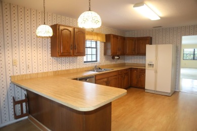 Welcome to 1436 SE Sunshine Ave, located in the highly desirable on Santa Lucia River Club in Florida - for sale on GolfHomes.com, golf home, golf lot