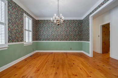 Discover timeless Southern elegance and luxury lakefront living on Great Waters Course At Reynolds Plantation in Georgia - for sale on GolfHomes.com, golf home, golf lot