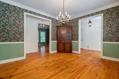 Discover timeless Southern elegance and luxury lakefront living on Great Waters Course At Reynolds Plantation in Georgia - for sale on GolfHomes.com, golf home, golf lot