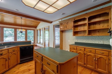 Discover timeless Southern elegance and luxury lakefront living on Great Waters Course At Reynolds Plantation in Georgia - for sale on GolfHomes.com, golf home, golf lot