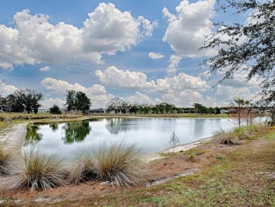 3/2 IRIS DESIGNER HOME with POND VIEW!  Located in The Village on Pennbrooke Fairways in Florida - for sale on GolfHomes.com, golf home, golf lot