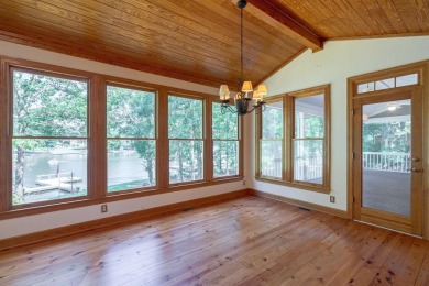 Discover timeless Southern elegance and luxury lakefront living on Great Waters Course At Reynolds Plantation in Georgia - for sale on GolfHomes.com, golf home, golf lot