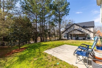 Welcome to this spacious 4-bedroom, 2.5-bath home in Covington on Indian Creek Golf Club in Georgia - for sale on GolfHomes.com, golf home, golf lot