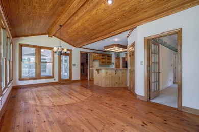 Discover timeless Southern elegance and luxury lakefront living on Great Waters Course At Reynolds Plantation in Georgia - for sale on GolfHomes.com, golf home, golf lot