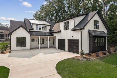 Nestled in the heart of Cuscowilla on Lake Oconee, this on The Golf Club at Cuscowilla in Georgia - for sale on GolfHomes.com, golf home, golf lot