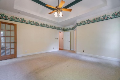 Discover timeless Southern elegance and luxury lakefront living on Great Waters Course At Reynolds Plantation in Georgia - for sale on GolfHomes.com, golf home, golf lot