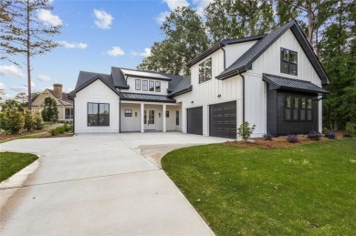 Nestled in the heart of Cuscowilla on Lake Oconee, this on The Golf Club at Cuscowilla in Georgia - for sale on GolfHomes.com, golf home, golf lot