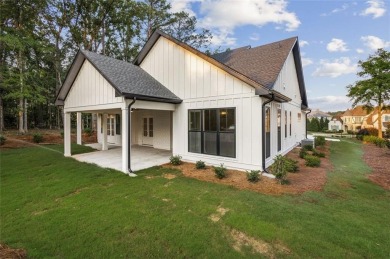 Nestled in the heart of Cuscowilla on Lake Oconee, this on The Golf Club at Cuscowilla in Georgia - for sale on GolfHomes.com, golf home, golf lot