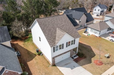 Welcome to this spacious 4-bedroom, 2.5-bath home in Covington on Indian Creek Golf Club in Georgia - for sale on GolfHomes.com, golf home, golf lot
