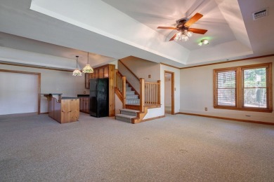 Discover timeless Southern elegance and luxury lakefront living on Great Waters Course At Reynolds Plantation in Georgia - for sale on GolfHomes.com, golf home, golf lot