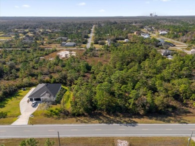 Discover the allure of this exceptional 1.24-acre wooded lot on Wedgefield Golf Club in Florida - for sale on GolfHomes.com, golf home, golf lot