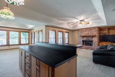 Discover timeless Southern elegance and luxury lakefront living on Great Waters Course At Reynolds Plantation in Georgia - for sale on GolfHomes.com, golf home, golf lot