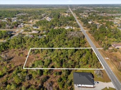 Discover the allure of this exceptional 1.24-acre wooded lot on Wedgefield Golf Club in Florida - for sale on GolfHomes.com, golf home, golf lot