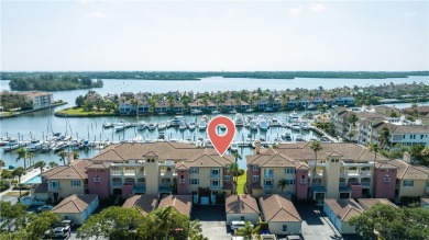 Rarely available three-bedroom penthouse with stunning views of on Grand Harbor Golf and Country Club in Florida - for sale on GolfHomes.com, golf home, golf lot