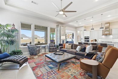 This stunning home is the beautiful sought -out Avalon floor on Wildhorse Golf Club of Robson Ranch in Texas - for sale on GolfHomes.com, golf home, golf lot