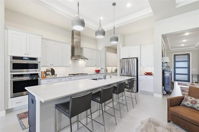 This stunning home is the beautiful sought -out Avalon floor on Wildhorse Golf Club of Robson Ranch in Texas - for sale on GolfHomes.com, golf home, golf lot