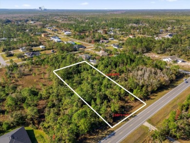 Experience the allure of this exceptional 1.03-acre wooded lot on Wedgefield Golf Club in Florida - for sale on GolfHomes.com, golf home, golf lot