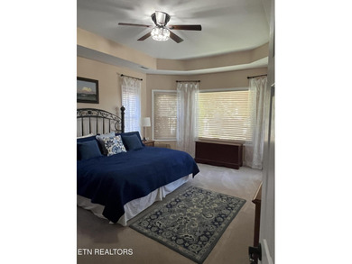 After driving past the picturesque stables and horses and on Rarity Bay Country Club - Loudon in Tennessee - for sale on GolfHomes.com, golf home, golf lot