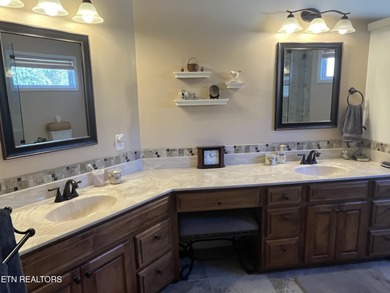 After driving past the picturesque stables and horses and on Rarity Bay Country Club - Loudon in Tennessee - for sale on GolfHomes.com, golf home, golf lot