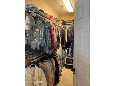 After driving past the picturesque stables and horses and on Rarity Bay Country Club - Loudon in Tennessee - for sale on GolfHomes.com, golf home, golf lot