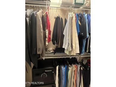 After driving past the picturesque stables and horses and on Rarity Bay Country Club - Loudon in Tennessee - for sale on GolfHomes.com, golf home, golf lot