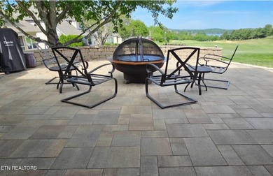 After driving past the picturesque stables and horses and on Rarity Bay Country Club - Loudon in Tennessee - for sale on GolfHomes.com, golf home, golf lot