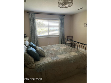 After driving past the picturesque stables and horses and on Rarity Bay Country Club - Loudon in Tennessee - for sale on GolfHomes.com, golf home, golf lot