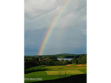 After driving past the picturesque stables and horses and on Rarity Bay Country Club - Loudon in Tennessee - for sale on GolfHomes.com, golf home, golf lot