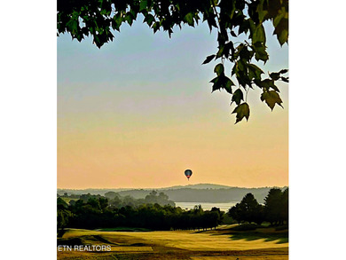 After driving past the picturesque stables and horses and on Rarity Bay Country Club - Loudon in Tennessee - for sale on GolfHomes.com, golf home, golf lot