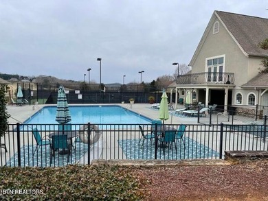 After driving past the picturesque stables and horses and on Rarity Bay Country Club - Loudon in Tennessee - for sale on GolfHomes.com, golf home, golf lot