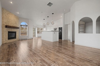 Welcome home to this immaculate townhome where comfort, style on Battlement Mesa Golf Course in Colorado - for sale on GolfHomes.com, golf home, golf lot