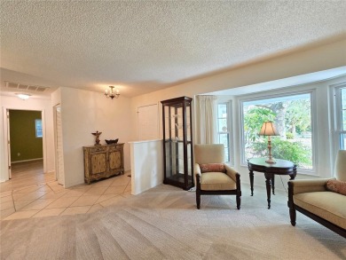 UPDATED 3-bedroom home located in a popular adult golf community on Highland Lakes Executive Golf Course in Florida - for sale on GolfHomes.com, golf home, golf lot