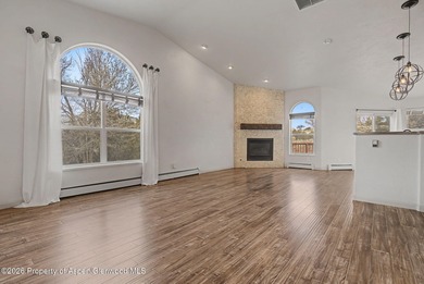 Welcome home to this immaculate townhome where comfort, style on Battlement Mesa Golf Course in Colorado - for sale on GolfHomes.com, golf home, golf lot