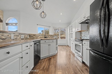 Welcome home to this immaculate townhome where comfort, style on Battlement Mesa Golf Course in Colorado - for sale on GolfHomes.com, golf home, golf lot