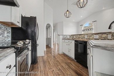 Welcome home to this immaculate townhome where comfort, style on Battlement Mesa Golf Course in Colorado - for sale on GolfHomes.com, golf home, golf lot