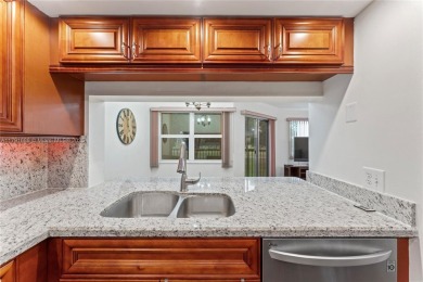 This tastefully remodeled 1/1 condo in Century Village on Flamingo Lakes Country Club in Florida - for sale on GolfHomes.com, golf home, golf lot