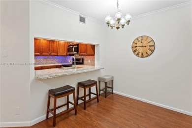 This tastefully remodeled 1/1 condo in Century Village on Flamingo Lakes Country Club in Florida - for sale on GolfHomes.com, golf home, golf lot
