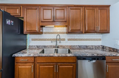 AFFORDABLE HOME IN THE HEART OF SPRING HILL ~ Welcome to this on Oak Hills Country Club in Florida - for sale on GolfHomes.com, golf home, golf lot