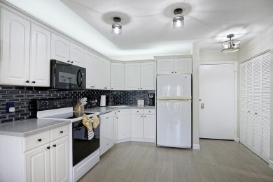 Meticulously remodeled, fully furnished, one bedroom, one bath on Ocean Village Golf Course in Florida - for sale on GolfHomes.com, golf home, golf lot